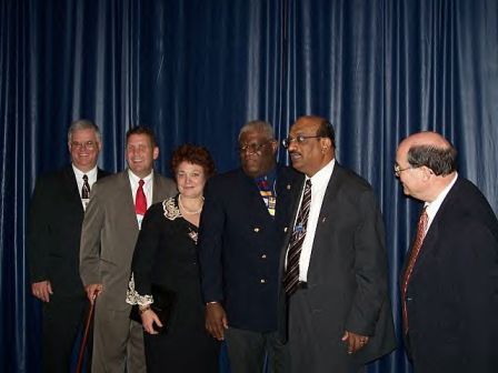 Pastor John receiving Denman Award at the 2006 Conference